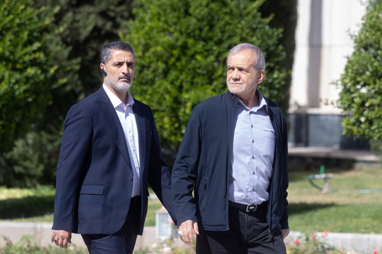 Iran's president Masoud Pezeshkian leaves a cabinet meeting with a bodyguard, Tehran, Iran, October 8. 2025