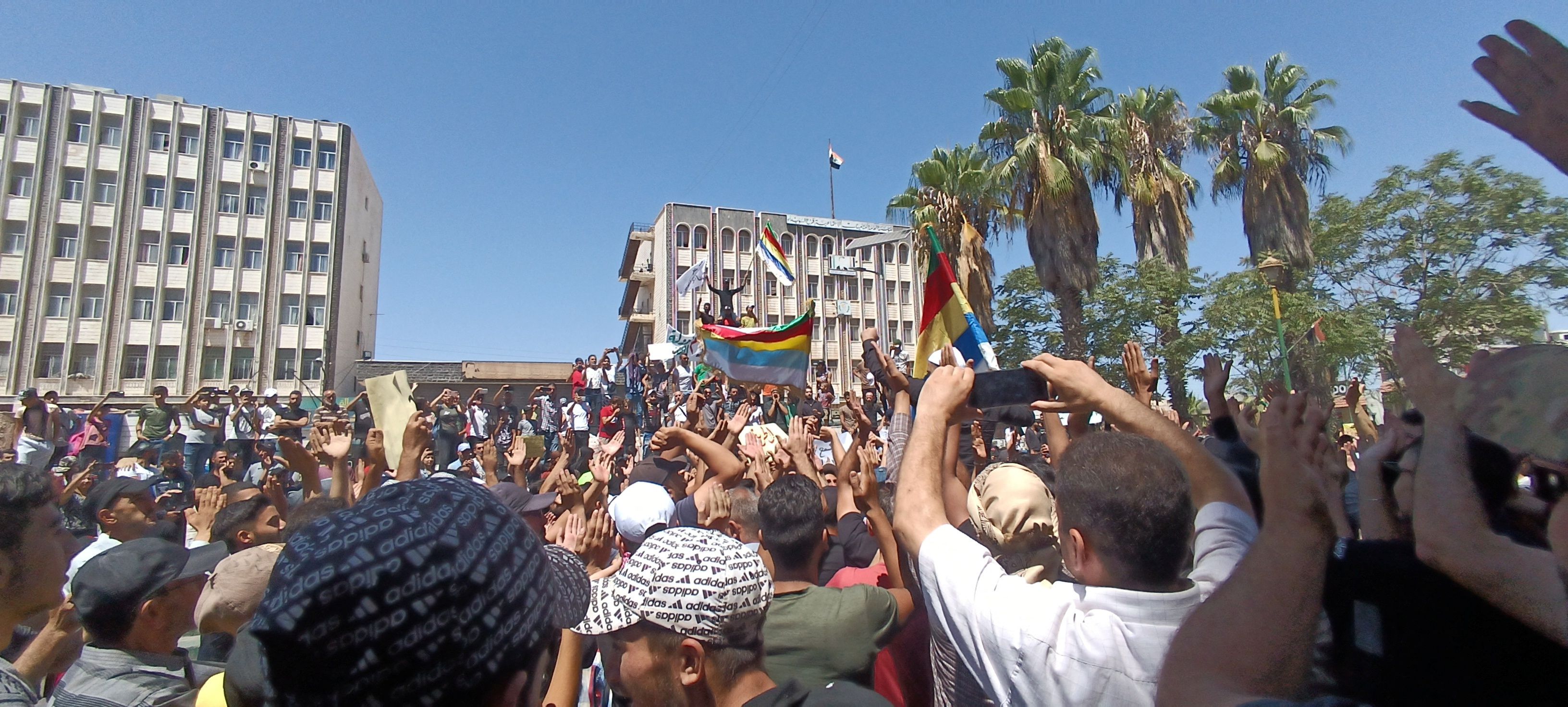 People protest against the latest decisions by Syrian government on increasing the prices of fuels in Sweida, Syria August 24, 2023 in this picture obtained from social media.