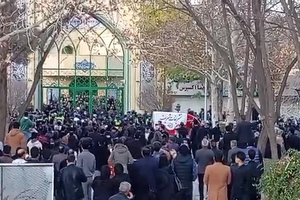 Rights lawyer's memorial turns into pro-monarchy rally in Iran's holiest city