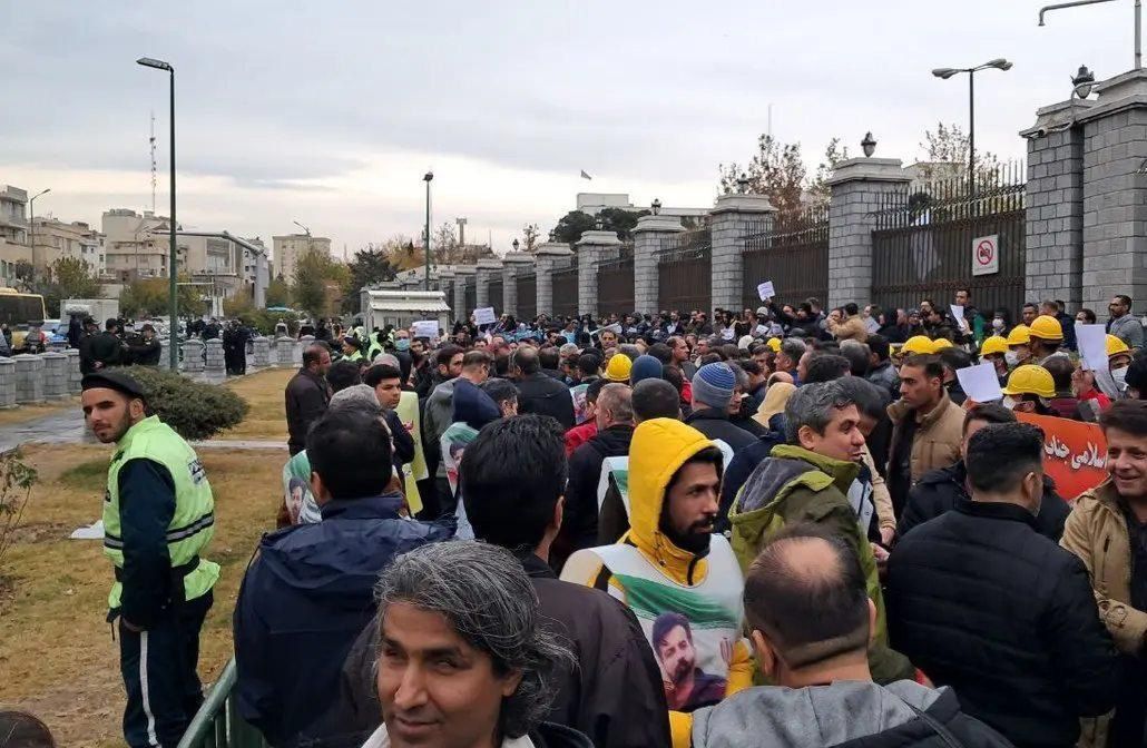 Iran welfare staff, contract workers protest outside parliament