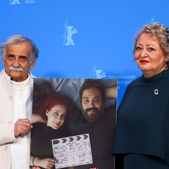 Cast members Lily Farhadpour and Esmail Mehrabi hold a picture of directors Maryam Moghaddam and Behtash Sanaeeha as they attend a photocall to promote the movie 'My Favorite Cake' ('Keyke mahboobe man') at the 74th Berlinale International Film Festival in Berlin, Germany, February 16, 2024.