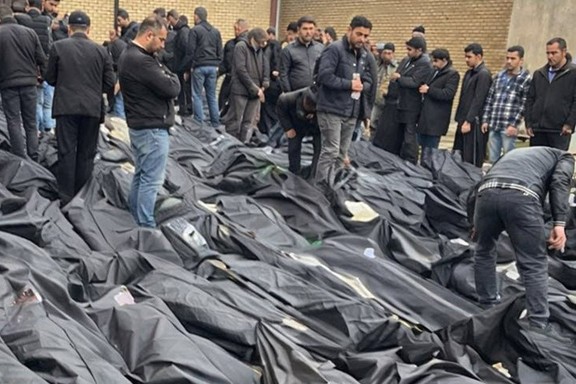 People search for loved ones among rows of bodybags in Tehran, Iran, January 2026