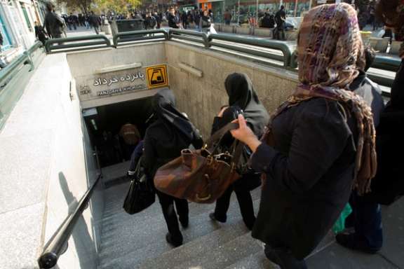 Passengers entering a metro station at the bazaar in Tehran