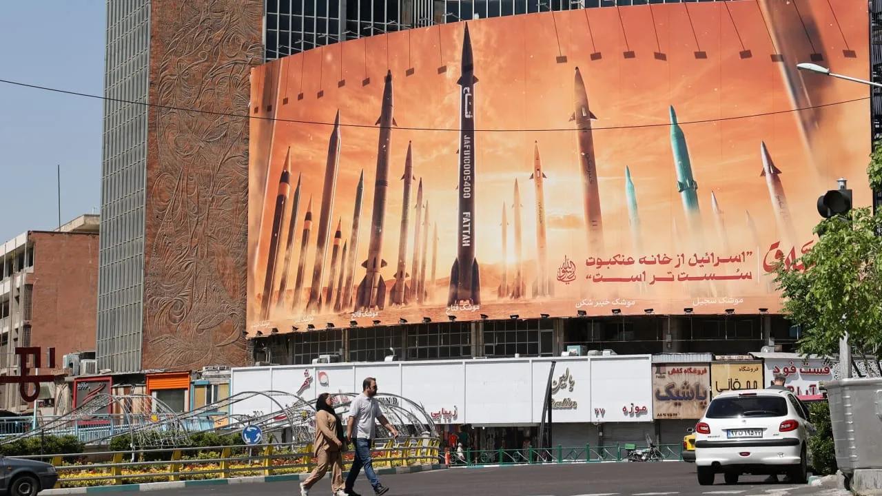An anti-Israel billboard with a picture of Iranian missiles is seen on a street in Tehran, Iran April 19, 2024.
