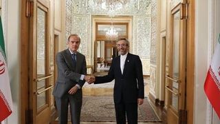 EU's Mora Holds Meeting In Tehran As Iran Arrests Two Europeans
