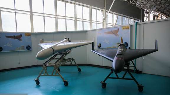 Two models of Iran’s kamikaze Shahed drones on display in Tehran