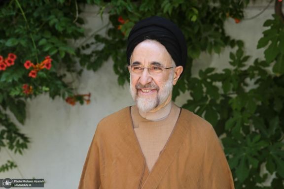 Former president Mohammad Khatami in his tan-color robe