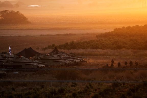 A formation of Israeli tanks is positioned near Israel's border with the Gaza Strip, in southern Israel October 21, 2023.