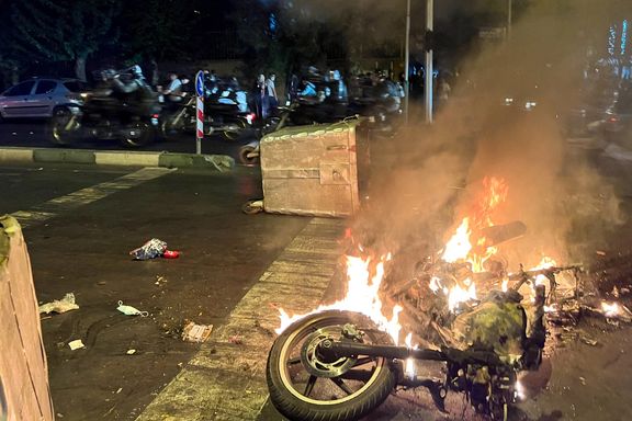 The first day of anti-government protests in Iran. A motorcycle of security forces burning in Tehran. Sept. 19, 2022