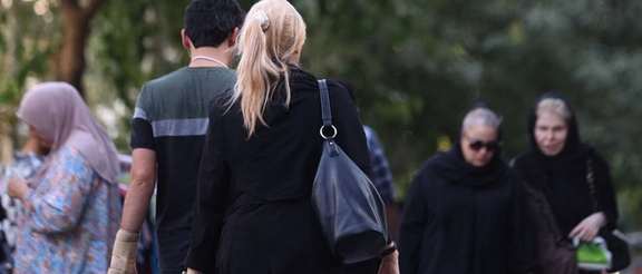 An Iranian woman without the mandatory hijab in Tehran