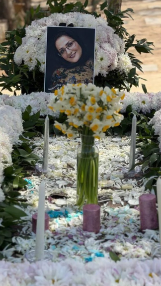 The grave of Arezoo Abedi during a memorial marking the fortieth day after her death