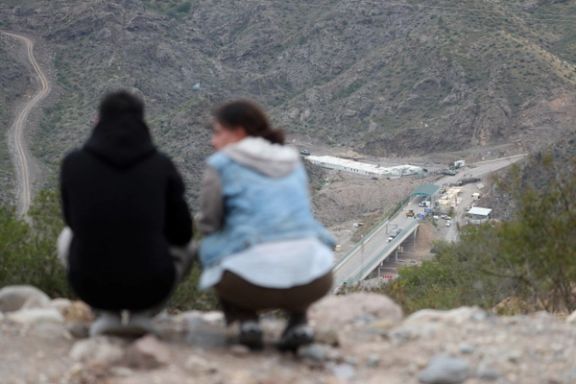 A view shows a border-crossing point on the frontier between Armenia and Azerbaijan and a base of Russian peacekeepers deployed in Nagorno-Karabakh as seen from a road near the village of Kornidzor, Armenia, September 23, 2023.