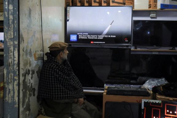 A man watches a news channel inside a shop after Pakistan conducted strikes inside Iran, two days after Tehran said it attacked militant bases inside Pakistani territory, Pakistan January 18, 2024.