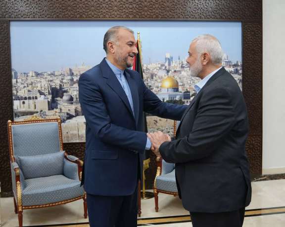 Iranian Foreign Minister Hossein Amir-Abdollahian (left) and Hamas Leader Ismail Haniyeh in Qatar (October 2023)