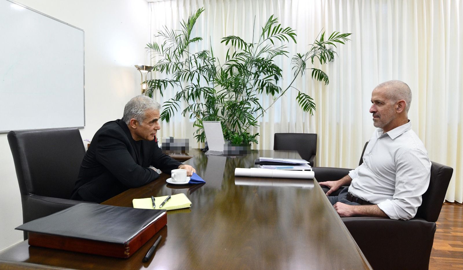 Israeli Prime Minister Yair Lapid (left) and Ronen Bar, the director of Israel’s security agency Shin Bet 