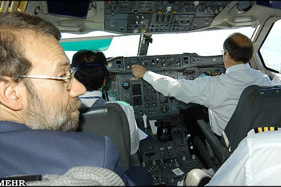 Iran’s parliament speaker Mohammad-Bagher Ghalibaf (right) in a cockpit of a plane and former Speaker of the Parliament Ali Larijani (left)