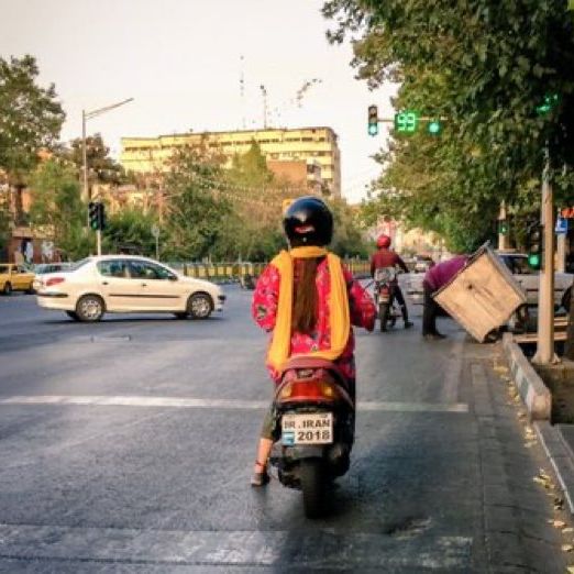 An Iranian woman riding a motorcycle in Tehran