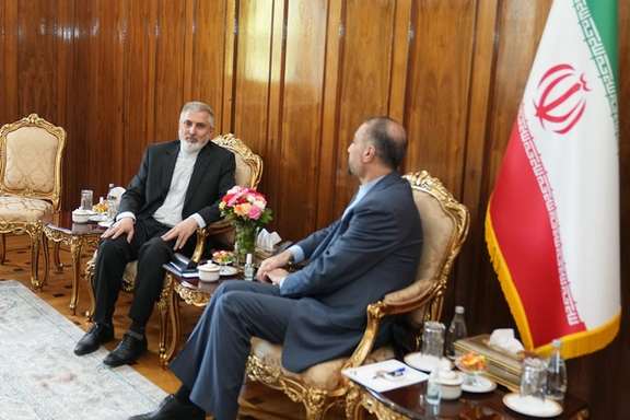 Iran’s ambassador to Australia Ahmad Sadeghi (left) during a meeting with Iranian Foreign Minister Hossein Amir-Abdollahian in Tehran