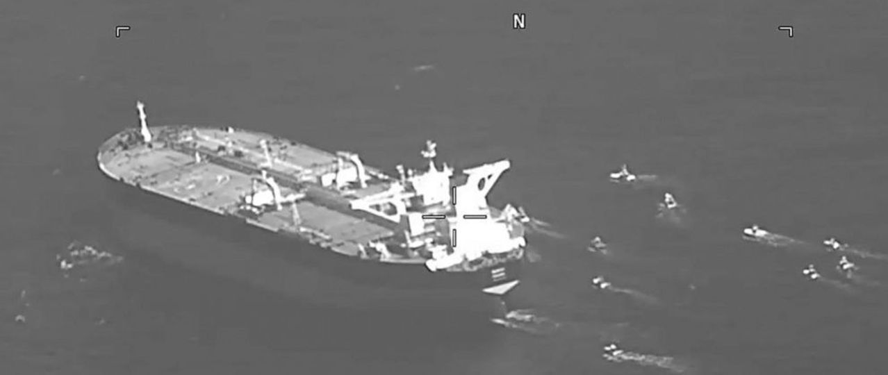 An oil tanker being seized by Iranian navy speedboats on May 3, 2023