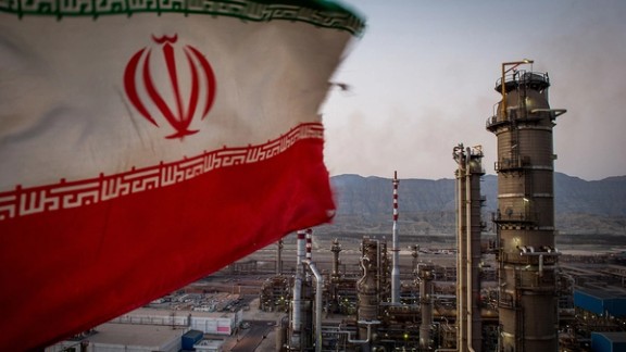 Islamic Republic’s flag flies over an oil facility in southern Iran