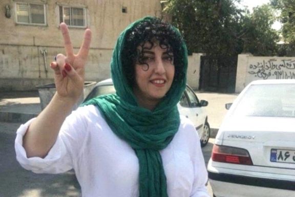 Iranian activist Narges Mohammadi, who won the Nobel Peace Prize, shows a victory sign, in an undisclosed location in Iran, in this handout image obtained on October 6, 2023.