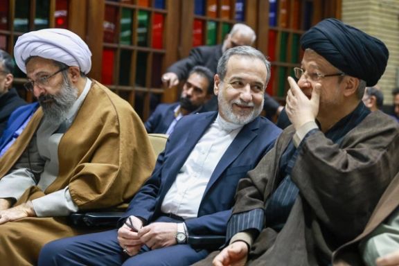 Iran's foreign minister Abbas Araghchi (centre) attending a memorial event in Tehran, February 24, 2026