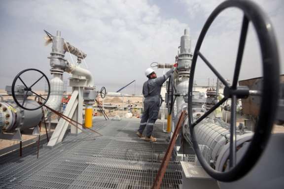 A worker is seen at Iraq's Majnoon oilfield near Basra, Iraq, March 31, 2021.