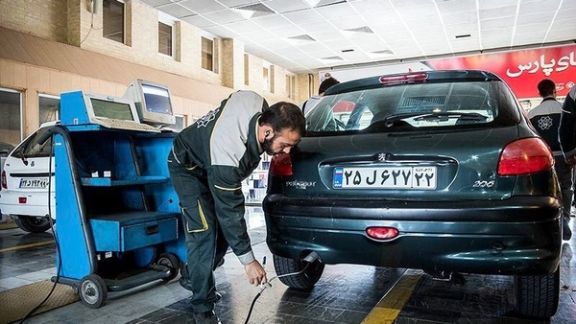 A car undergoing a technical inspection in Tehran