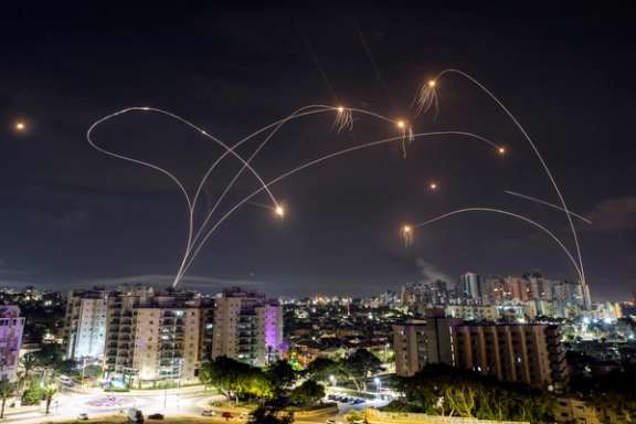 Israel's Iron Dome anti-missile system intercepts rockets launched from the Gaza Strip, as seen from Ashkelon in southern Israel October 8, 2023.