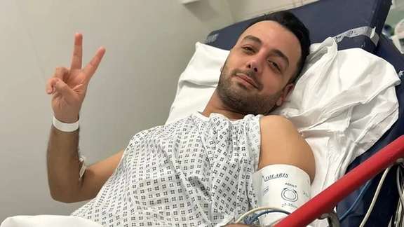 Pouria Zeraati, the television host of the "Last Word" program on Iran International, at hospital following a knife attack in London (March 30, 2024)