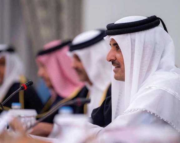Qatar's Emir Sheikh Tamim bin Hamad al-Thani speaks in Doha, Qatar, December 8, 2021.