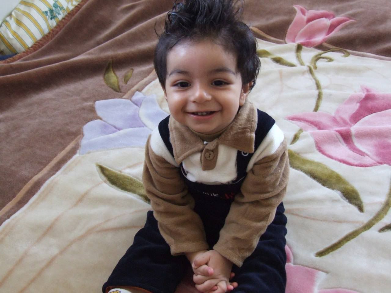 A childhood photo of killed protester Sam Rezaee, shared by one of his friends with Iran International.