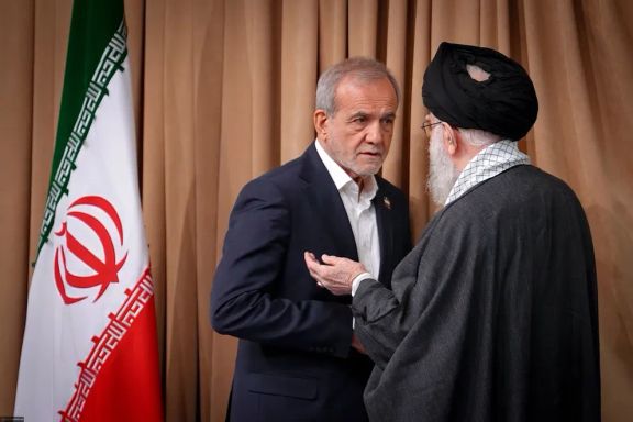 Iran's Supreme Leader Ali Khamenei (right) speaks to President Masoud Pezeshkian on September 7, 2025.