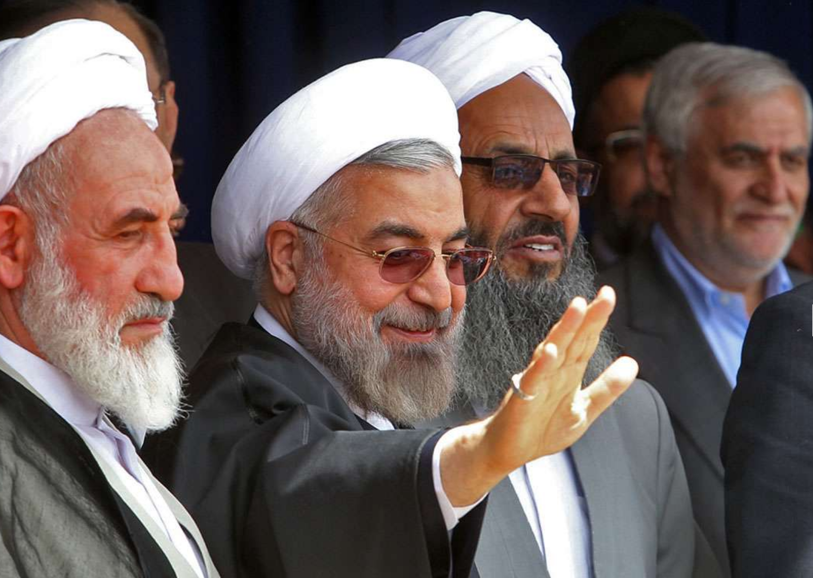 Former president Hassan Rouhani standing next to Mowlavi Abdolhamid (undated)