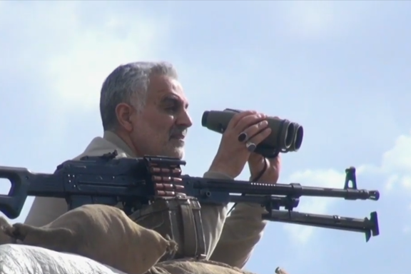 In this undated photo Iran's Qasem Soleimani overlooking a conflict zone in Syria.