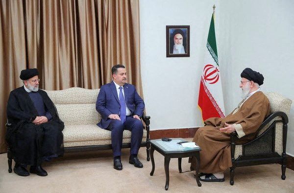 Iraqi Prime Minister Mohammed Shia al-Sudani meets with Iranian President Ebrahim Raisi and Iran's ruler Ali Khamenei in Tehran, November 6, 2023.