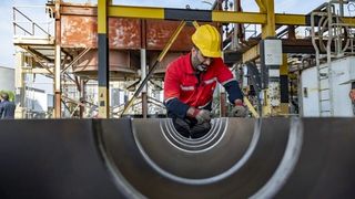 Iranian workers and consumers to bear cost of budget deficit, experts warn