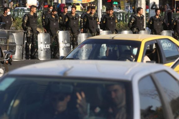 Iran's riot police forces stand in a street in Tehran, Iran, October 3, 2022.