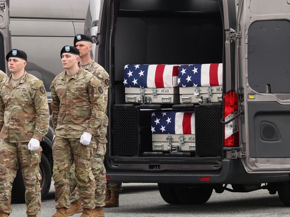 Members of the military stand as transfer cases lie inside a vehicle during a dignified transfer of the remains of six U.S. Army service members of the 103rd Sustainment Command, who were killed in Kuwait, Major Jeffrey O'Brien, Capitain Cody Khork, Chief Warrant Officer 3 Robert Marzan, Sergeant 1st Class Nicole Amor, Sergeant 1st Class Noah Tietjens and Sergeant Declan Coady, amid the U.S.-Israeli conflict with Iran, at Dover Air Force Base in Dover, Delaware, U.S., March 7, 2026.