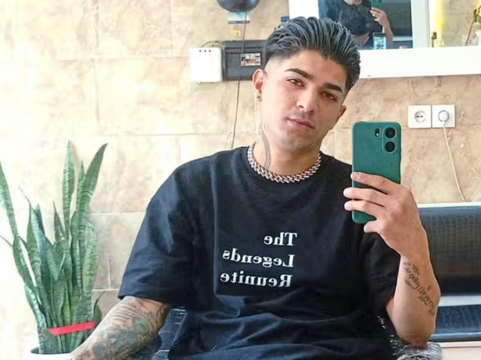 Iranian agents cut protester's royalist tattoos before killing him