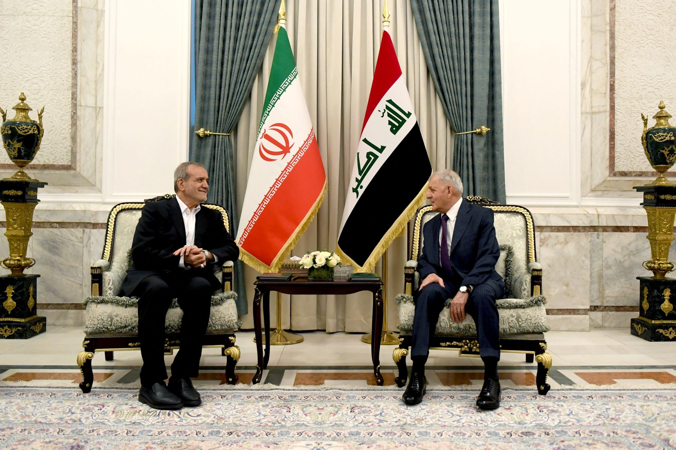 Iraqi President Abdul Latif Rashid meets with Iranian President Masoud Pezeshkian in Baghdad, Iraq September 11, 2024. 