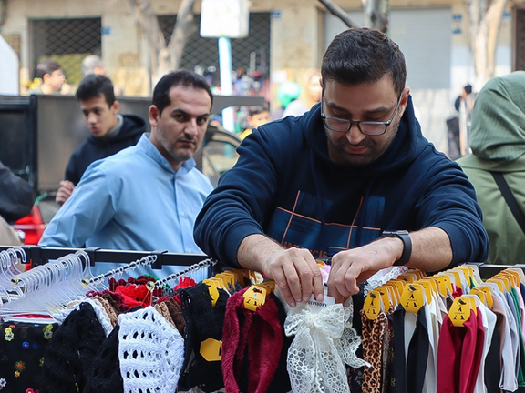 As war looms, Iran ensures military gets paid but people struggle