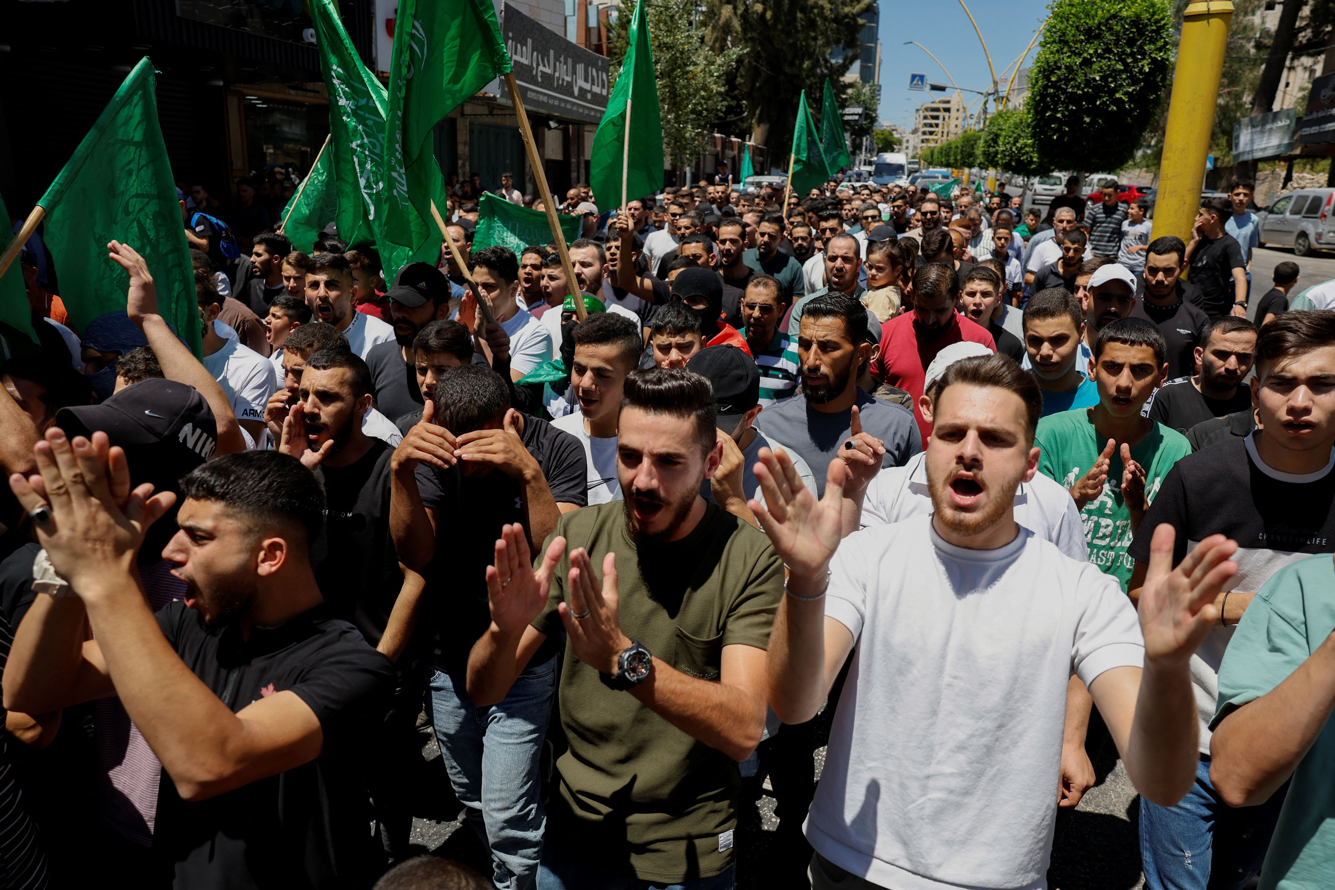 Palestinians attend a protest after the assassination of Hamas leader Ismail Haniyeh in Iran, in Hebron in the West Bank July 31, 2024. 