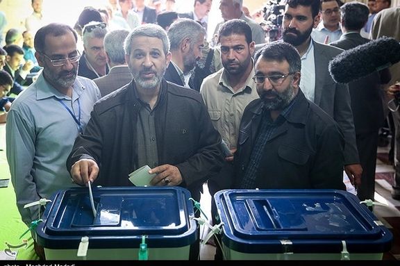 A file photo of Iranians voting in an election