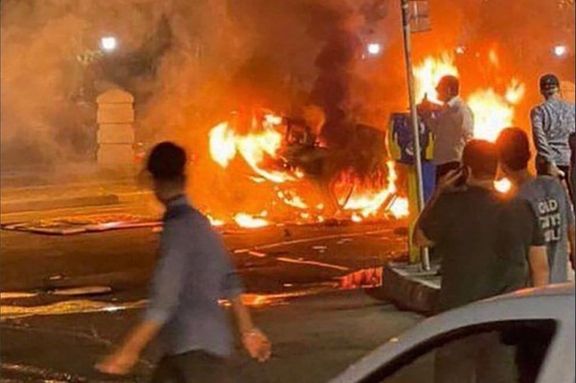 Angry protesters set fire to a police car in Sanandaj, the native region of Mahsa Amini, on November 16, 2022