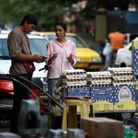 Iran faces region’s harshest mix of wartime contraction and inflation