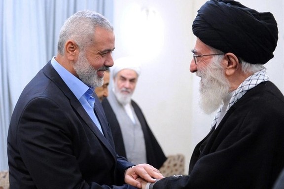 Hamas chief Ismail Haniyeh (left) and Iran's Supreme Leader Ali Khamenei