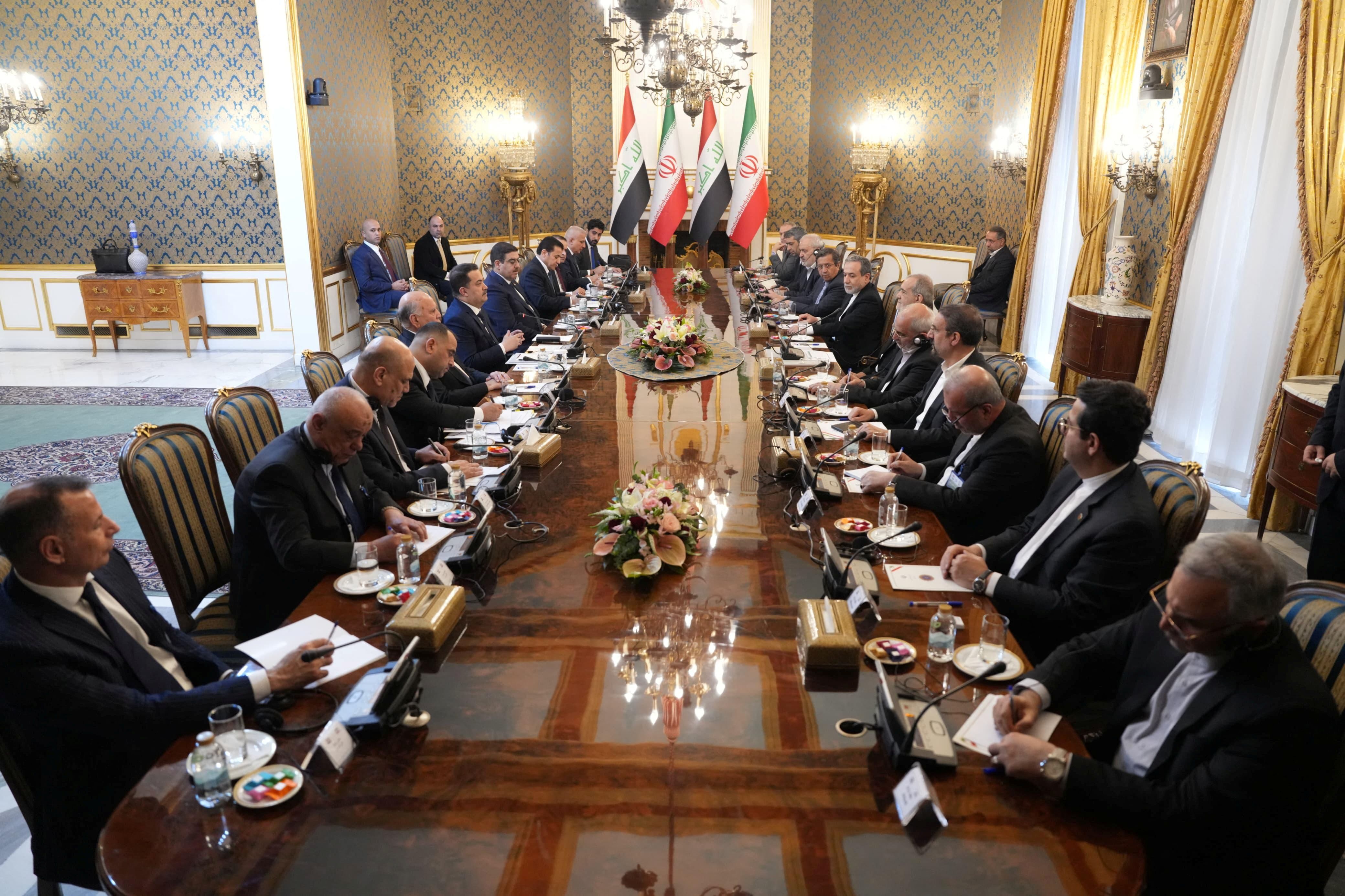 Iraqi Prime Minister Mohammed Shia al-Sudani and his accompanying delegation attend a meeting with Iranian President Masoud Pezeshkian in Tehran, Iran, January 8, 2025.