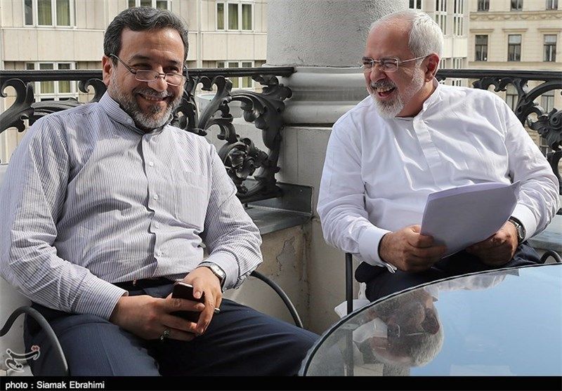 Iranian Foreign Minister Abbas Araghchi (left) and former Foreign Minister Javad Zarif 