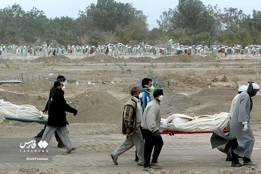 People carrying bodies of the victims of Bam earthquake (December 2023) 